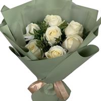 A bouquet of 7 white roses