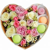 Box with roses, hypericum and macaroons