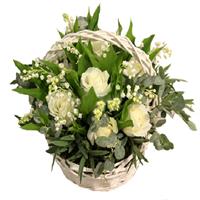 Delicate bouquet of roses and lilies of the valley