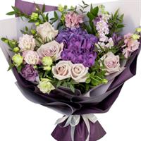 Delicate bouquet with imported roses and eustoma