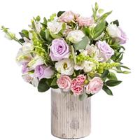Bright composition of roses, eustom and alstroemeria