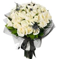 bouquet of white roses with a spiders