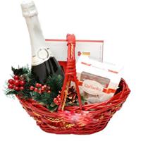 Basket with sweets and champagne