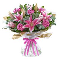 Bouquet of pink lilies and roses