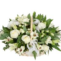 Basket with white lilies and roses