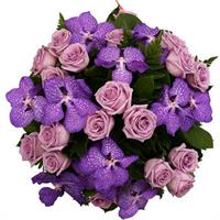 Bouquet of purple roses and orchids