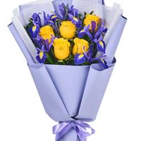 Bouquet of yellow roses and purple irises
