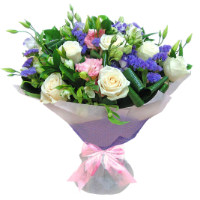 A bouquet of white roses, white and pink eustoma and purple freesia 