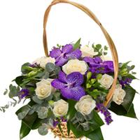 Basket with orchids and roses