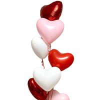 Stack of 7 heart-shaped balloons