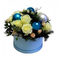White roses and fir branches with New Year's decor