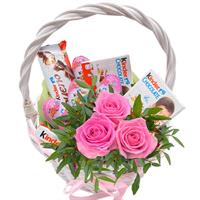 Small gift basket with sweets and flowers 