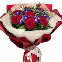 Vibrant bouquet of roses and irises