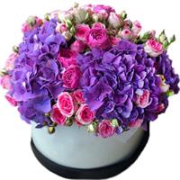 Sensual bouquet of pion-shaped roses and hydrangeas