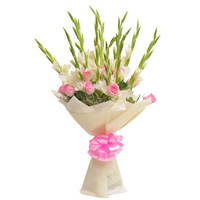 10 white gladioluses and 7 pink roses