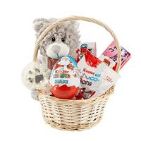 Basket with a toy and sweets
